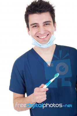 Dentist With Toothbrush Stock Photo