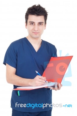 Doctor Making A Note Stock Photo