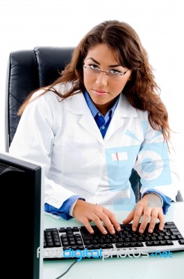 Doctor Working On Computer Stock Photo