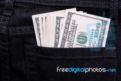 dollar In jeans Pocket Stock Photo