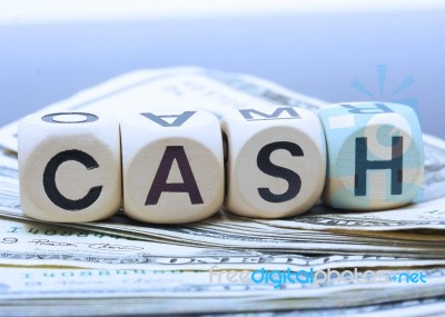 Dollars And Cash Cube Stock Photo