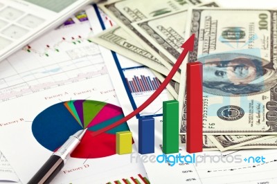 Dollars And Graph Stock Photo