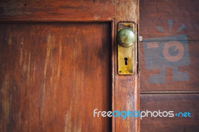 Door Knob And Keyhole Made Of Brass Stock Photo