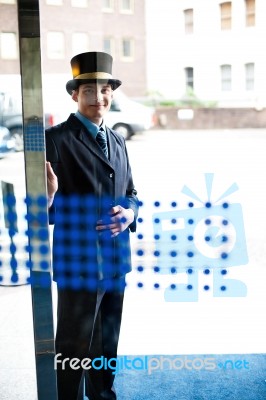 Doorman At Your Service Stock Photo