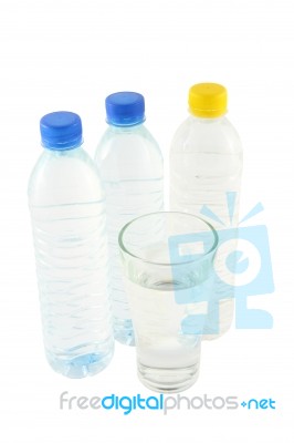Drinking Water In Bottles And Glass Stock Photo
