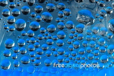 Drop Of Water On Glass Surface Stock Photo