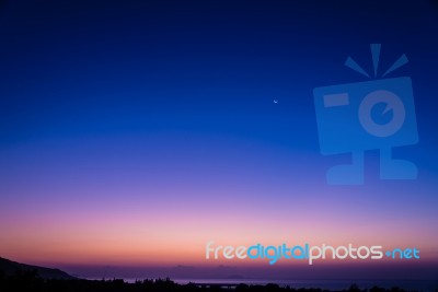 Early Morning Dawn Twilight With Moon And Star Stock Photo