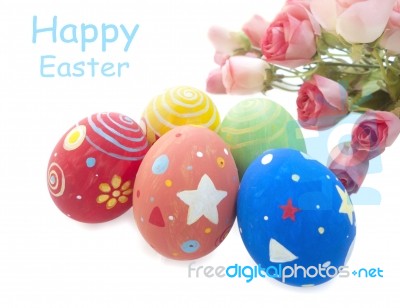 Easter Eggs And Roses Stock Photo