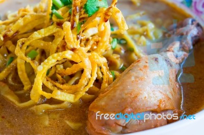 Egg Noodle And Yellow Curry With Chicken Stock Photo