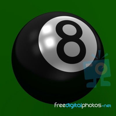 Eight Ball In Focus On Green Background Stock Image