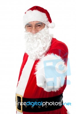 Elderly Cheerful Santa Pointing At You Stock Photo