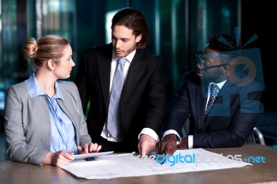 Employer Explaining Business Plan To His Colleagues Stock Photo