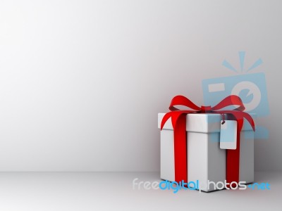 Empty White Wall With Gift Box Stock Image