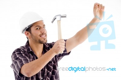 Engineer In Action With Hammer Stock Photo