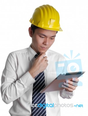 Engineer Working With Tablet Stock Photo