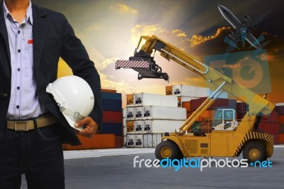 Engineering Man And Safety Helmet Working In Container Dock Use Stock Photo