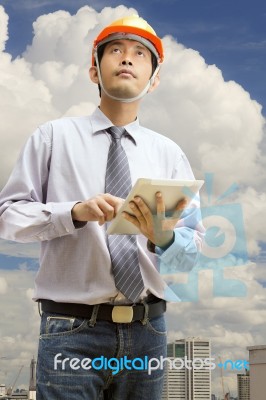 Engineers And Architects Using Digital Tablet At Working Stock Photo