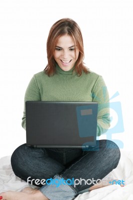 Excited Girl With Laptop Stock Photo