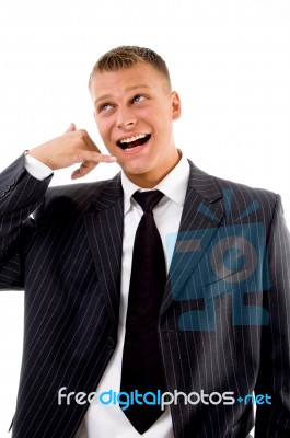 Executive Showing Telephone Gesture Stock Photo