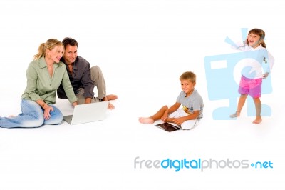 Family Using Digital Tablet Stock Photo