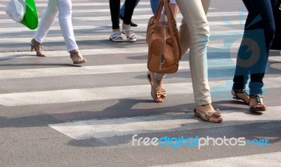Feet On The Pedestrian Crossing Stock Photo