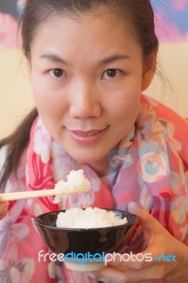 Female Asian Rice Stock Photo