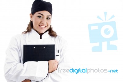 Female Chef Holding Clipboard Stock Photo