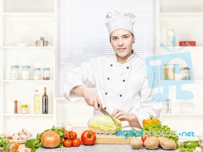 Female Chef Preparing Meal Stock Photo