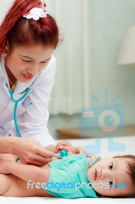 Female Doctor Checking Baby Petient Stock Photo