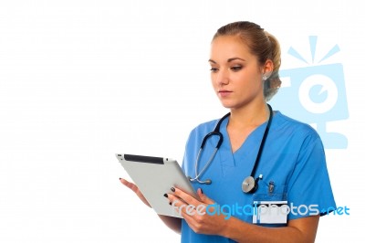 Female Doctor Using Tablet Pc Stock Photo