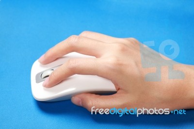 Female Hand Using Mouse Stock Photo