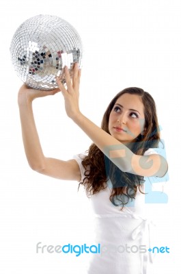 Female Looking At Disco Mirror Ball Stock Photo