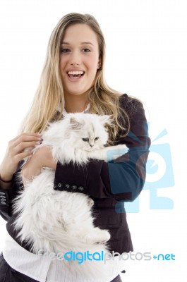 Female Model Standing With Cat Stock Photo