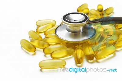 Fish Oil And Stethoscope Stock Photo