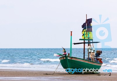 Fishing Boat On The Beach Stock Photo
