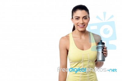 Fit Woman Holding Sipper Bottle Stock Photo