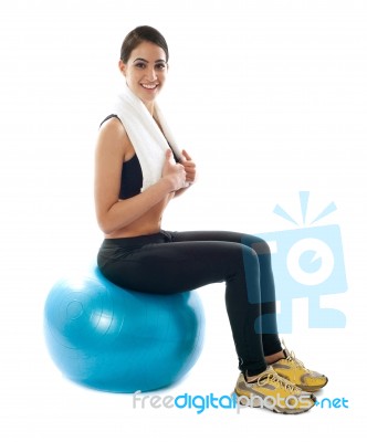Fitness Lady Sitting On Ball Stock Photo
