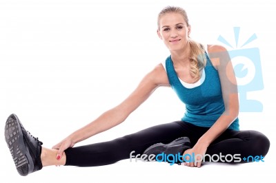 Fitness Woman Doing Stretching Exercise Stock Photo