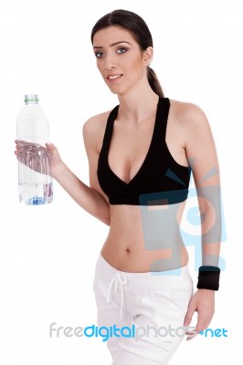 Fitness Women Holding A Water Bottle Stock Photo