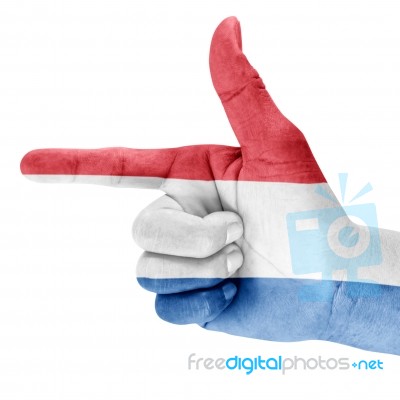 Flag Of The Kingdom Of The Netherlands On Shooting Hand Stock Photo