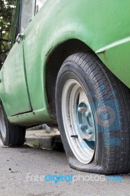Flat Tire Of Old Car Stock Photo