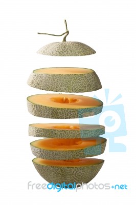 Flying Slice Of Melon. Isolated And Clipping Path Stock Photo