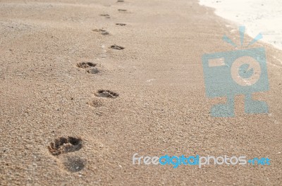 Footprints On Sand Stock Photo