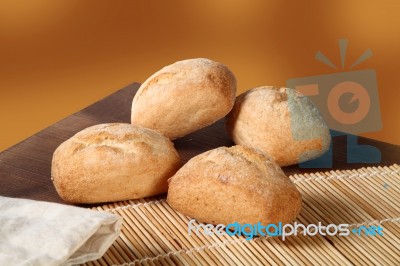 Four Breads On The Table Stock Photo