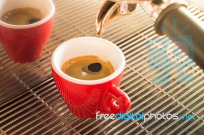 Fresh Brew Hot Coffee From Espresso Machine With Vintage Filter Stock Photo