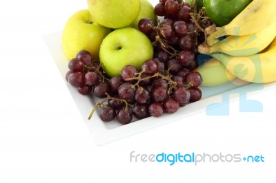 Fresh Mixed Fruit Focus Grape On White Background Stock Photo
