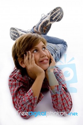 Front View Of Child Looking Upward Stock Photo