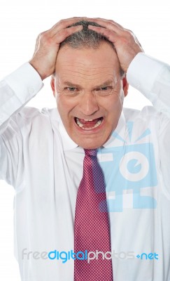 Frustrated Senior Businessman Stock Photo