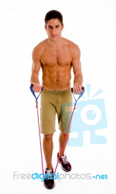 Full Body Of Exercising Man Stock Photo