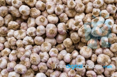 Garlic In Market Stock Photo